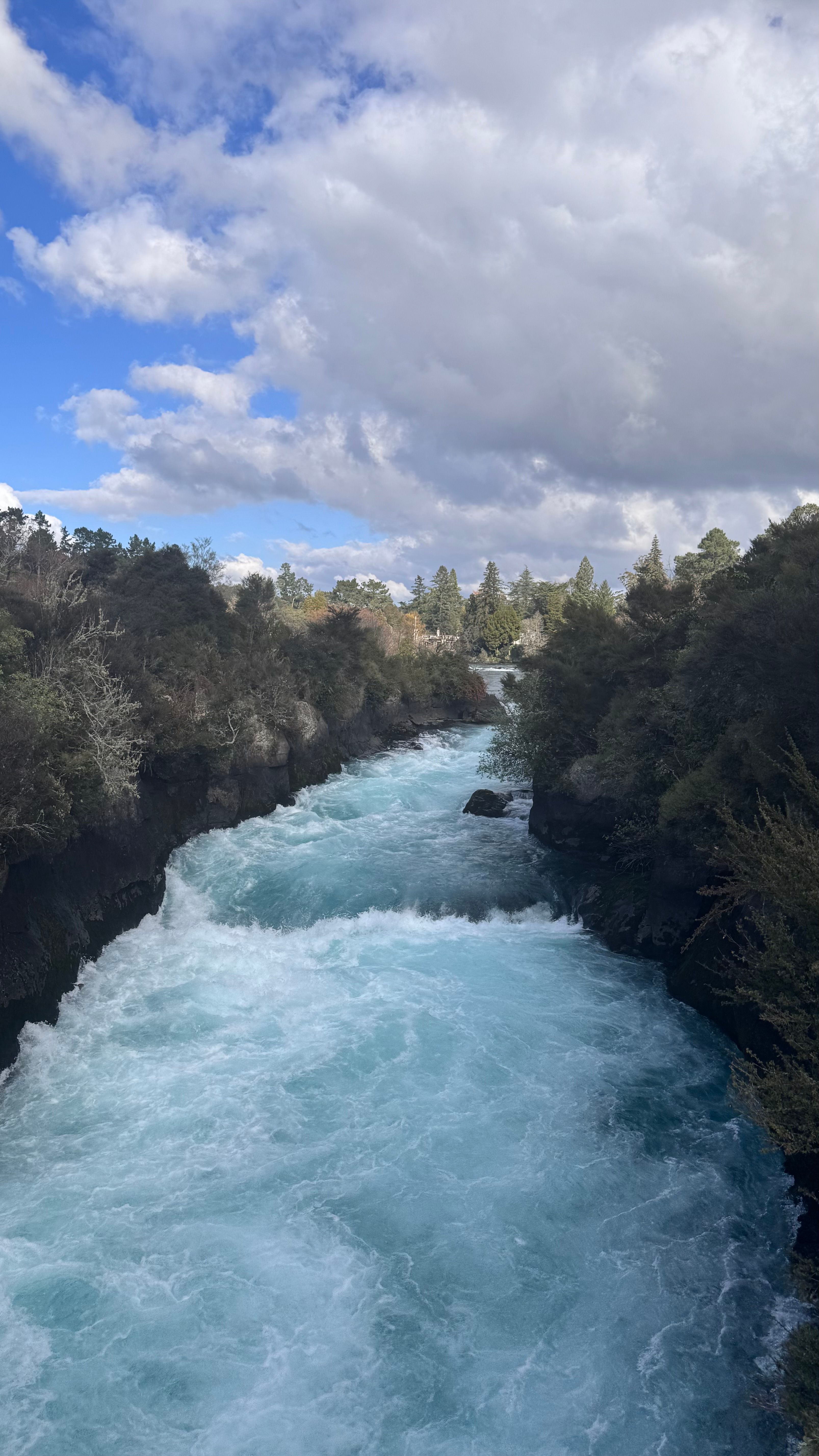 Rushing River Under Dramatic Clouds · Free Stock Photo