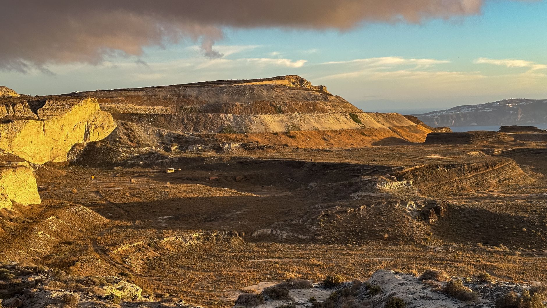 Red Beach Santorini during golden hour with warm light on red cliffs