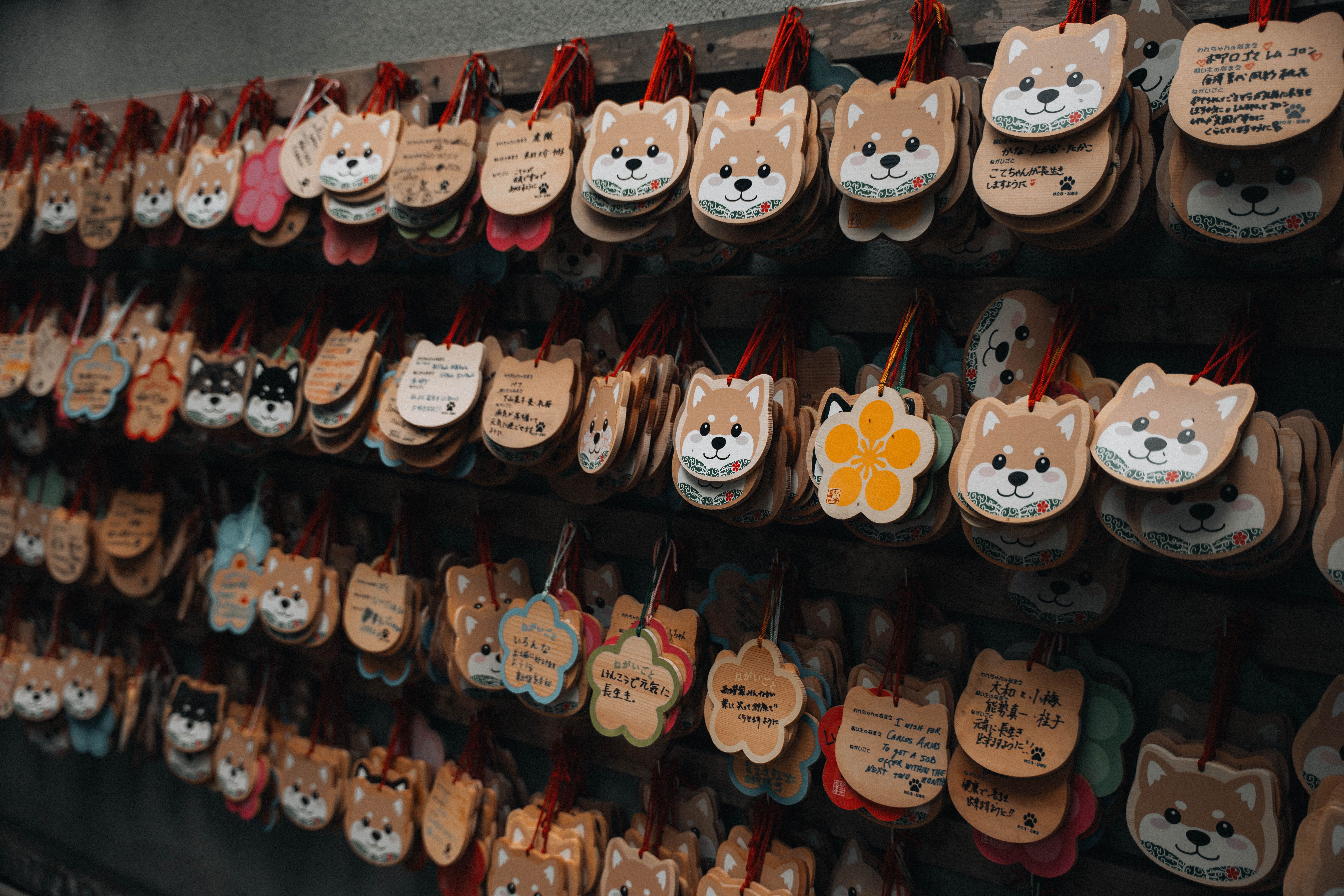 Handcrafted Dog-Themed Ema Plaques in Japan · Free Stock Photo