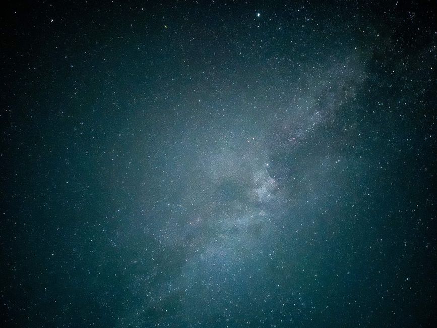 A breathtaking view of the Milky Way galaxy stretching across a starry night sky.