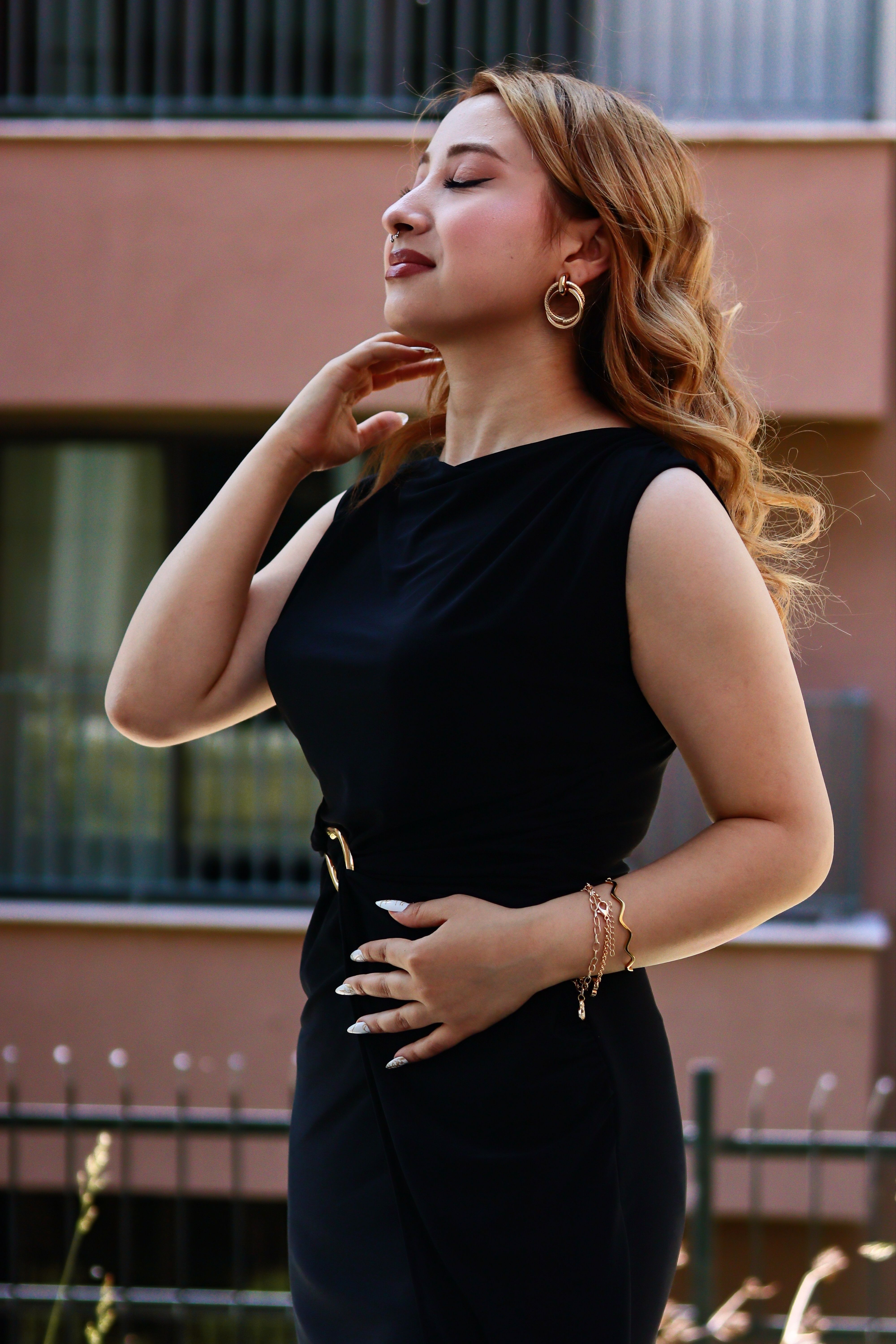 Elegant Woman in Black Dress Outdoors · Free Stock Photo