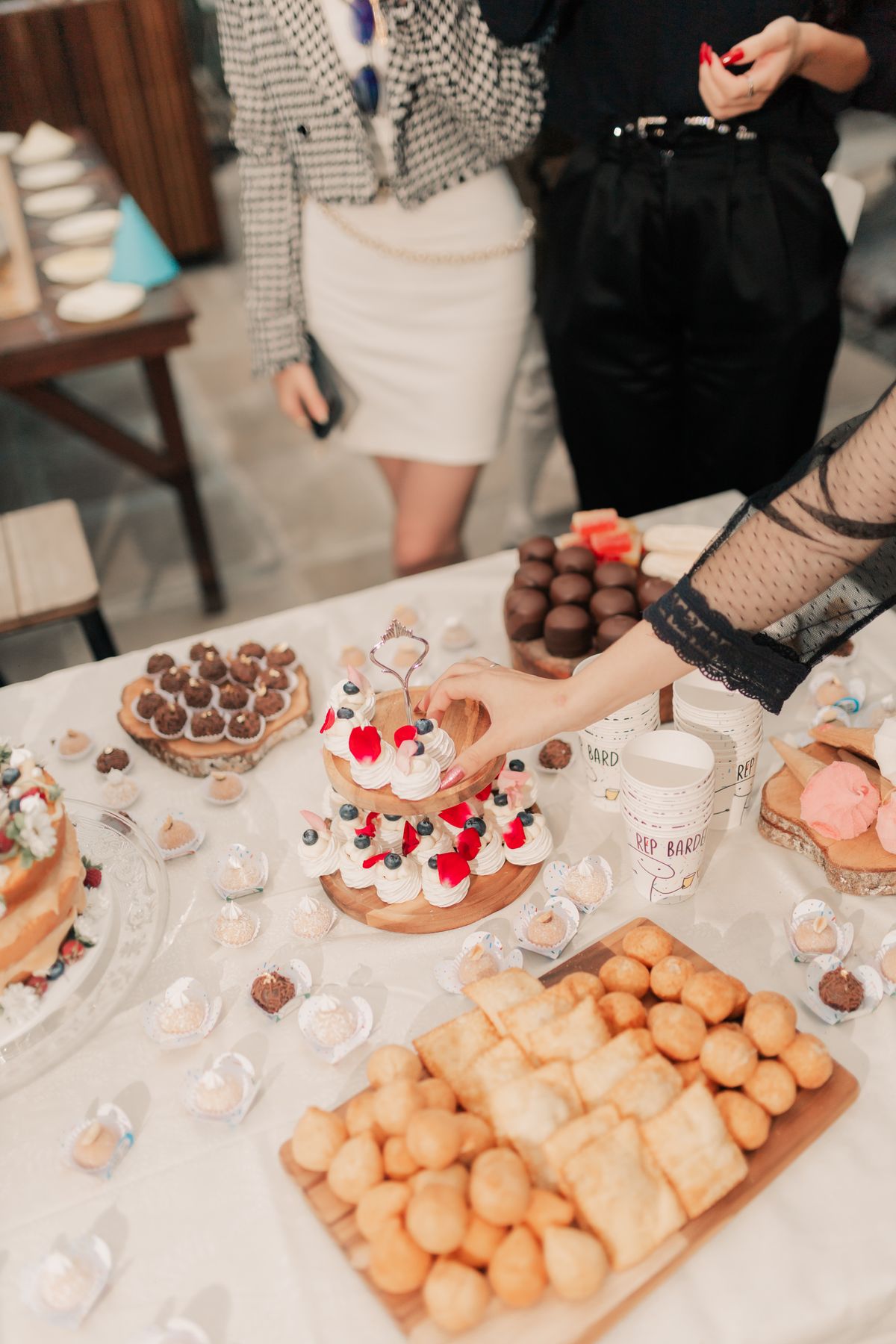 Elegant dessert table with pastries and cakes