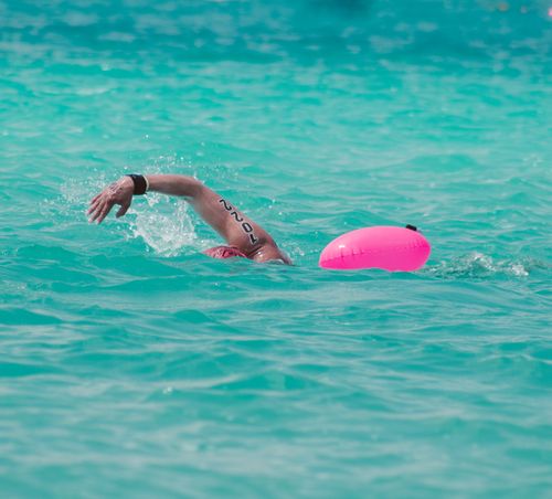 Free A swimmer enjoying open water swimming in the turquoise waters of Bacalar, Quintana Roo. Stock Photo