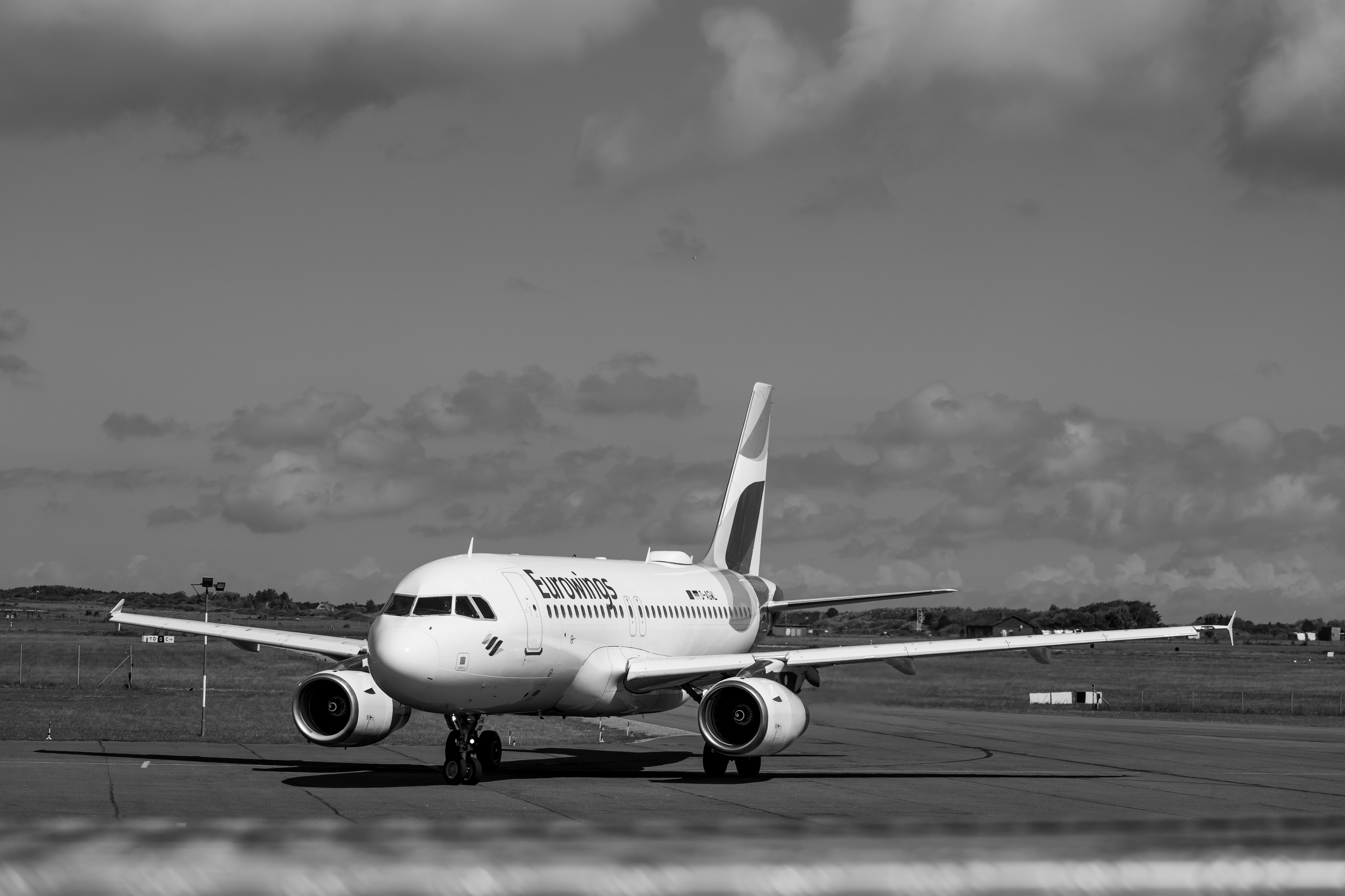 Monochrome Airplane on Runway · Free Stock Photo
