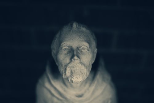 Free Top view of a stone sculpture with a moody, dark atmosphere. Stock Photo