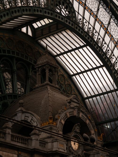 Free Detailed view of ornate gothic architecture under a grand glass roof. Perfect for historical themes. Stock Photo
