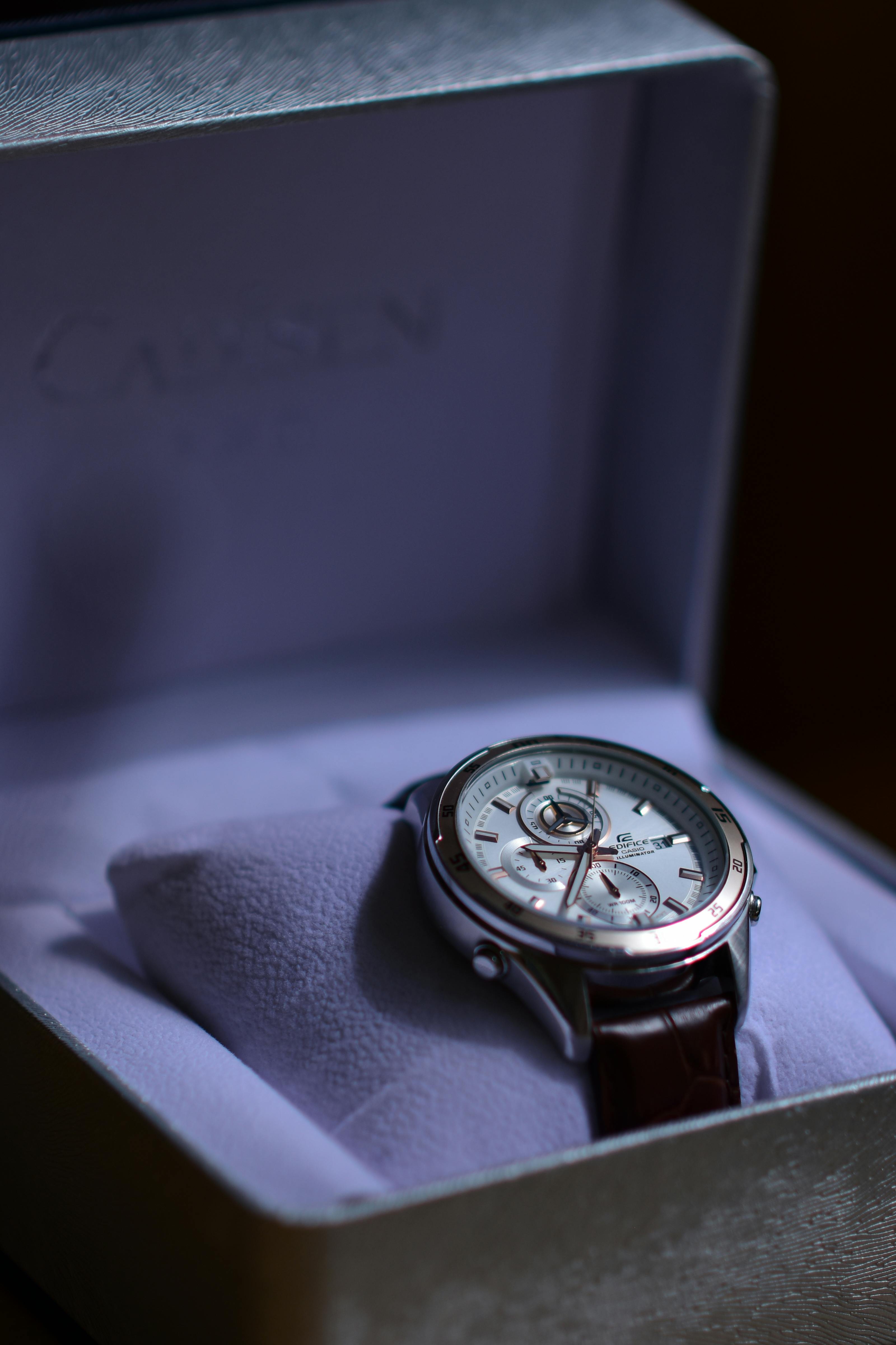 Sophisticated men's wristwatch elegantly displayed in a luxurious gift box, perfect for special occasions.
