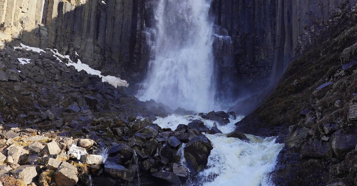 Stunning Icelandic Waterfall with Basalt Columns · Free Stock Photo