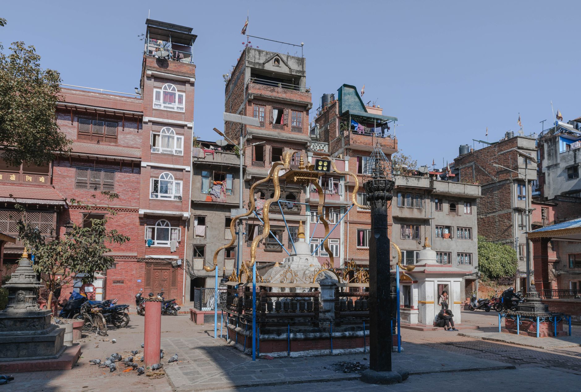 Explore vibrant traditional architecture in a bustling square in Kathmandu, Nepal, showcasing local culture.
