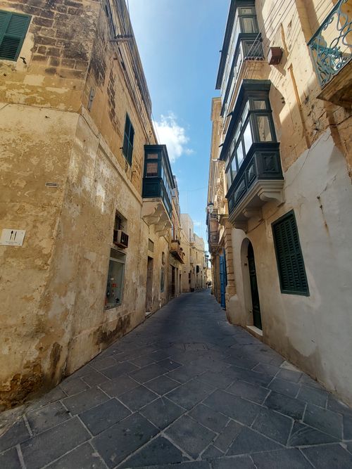 Free Explore the charming narrow streets with historic architecture in Mdina, Malta. Stock Photo