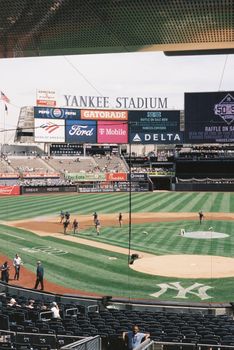A view of Yankee Stadium's baseball field during the day, capturing the infield and outfield.