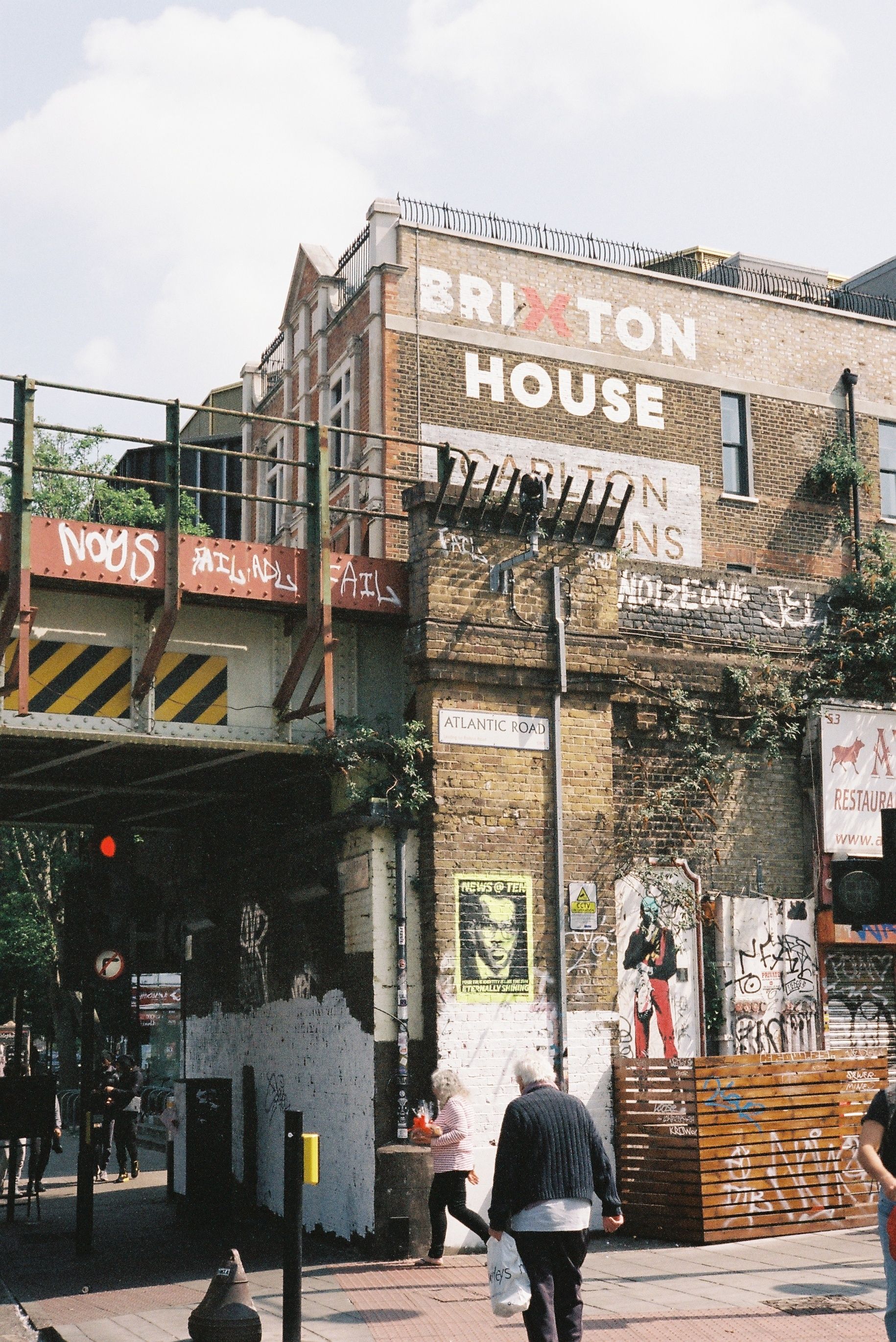 Urban scene with graffiti at Brixton House, showcasing London's eclectic street culture.