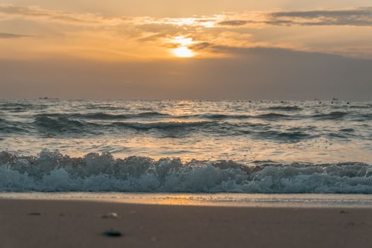 Peaceful sunset over the waves at Durrës Beach in Albania, capturing serene natural beauty.