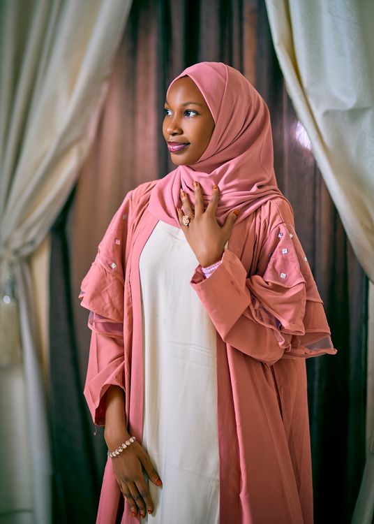 Elegant Portrait of Woman in Pink Hijab Indoors · Free Stock Photo