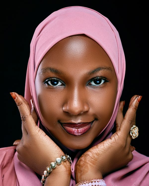 Elegant Portrait of Woman in Pink Hijab · Free Stock Photo