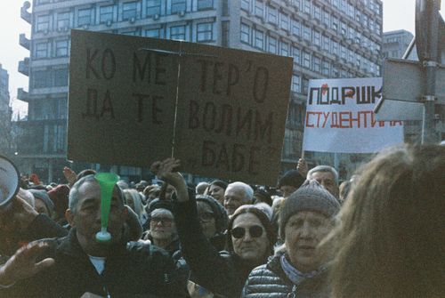 Free A large, peaceful city protest with diverse participants holding signs and banners. Stock Photo