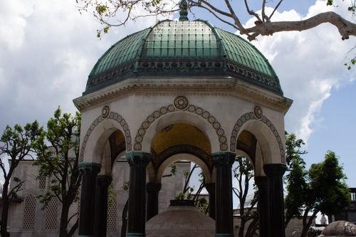 Free View of the beautiful German Fountain in Istanbul, showcasing its intricate architecture and green dome. Stock Photo