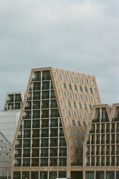 Modern exterior view of Scandinavian architectural design with unique geometric shapes.