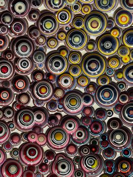 Vibrant abstract art with multicolored concentric circles, Lisbon art display.