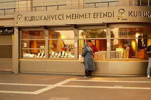 A customer at Kurukahveci Mehmet Efendi coffee shop in daylight.