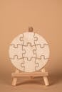 Round Wooden Puzzle on a Mini Easel