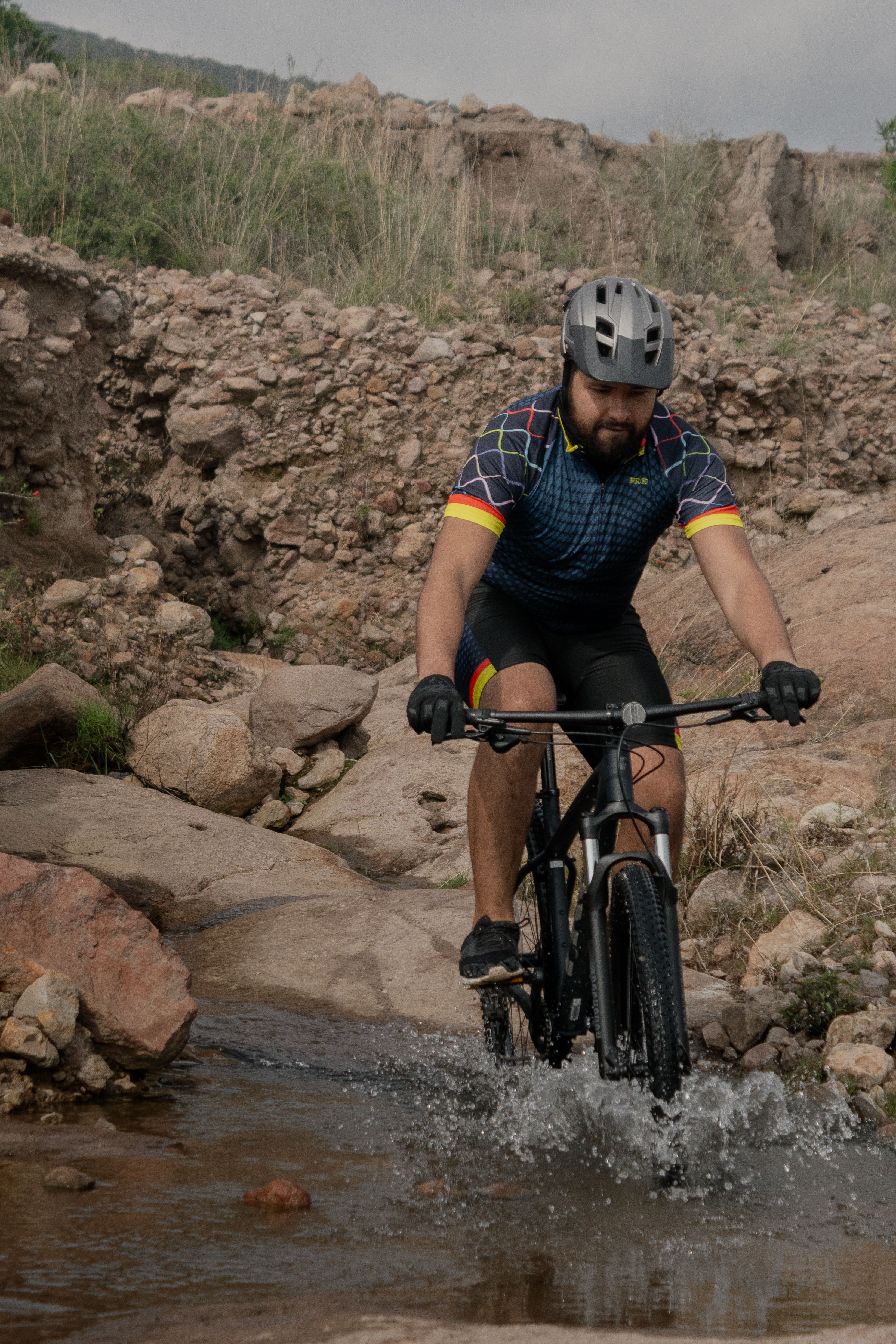An adventurous mountain biker tackles rough terrain in San Luis Potosí, Mexico.