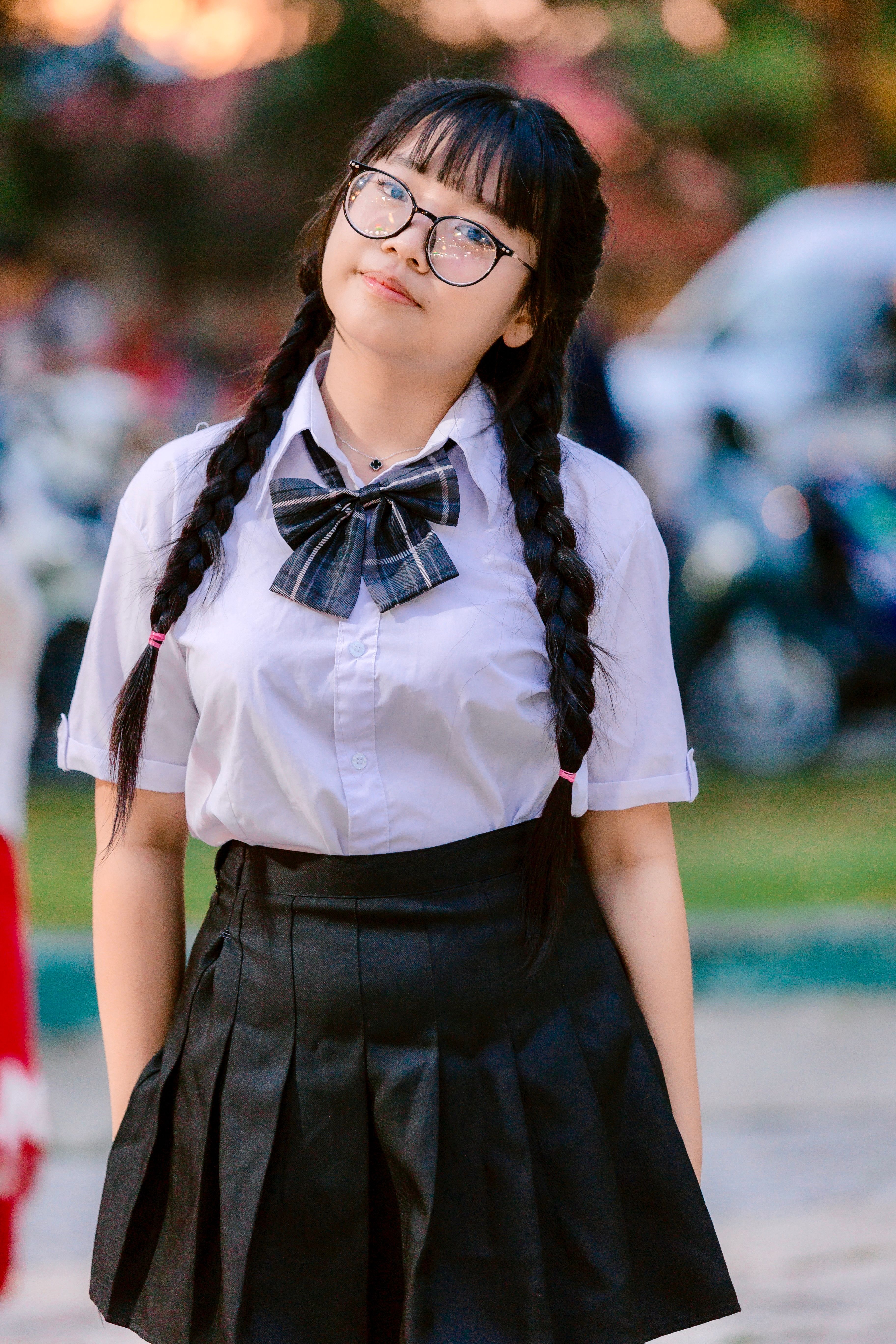 Young Woman in School Uniform Outdoors · Free Stock Photo
