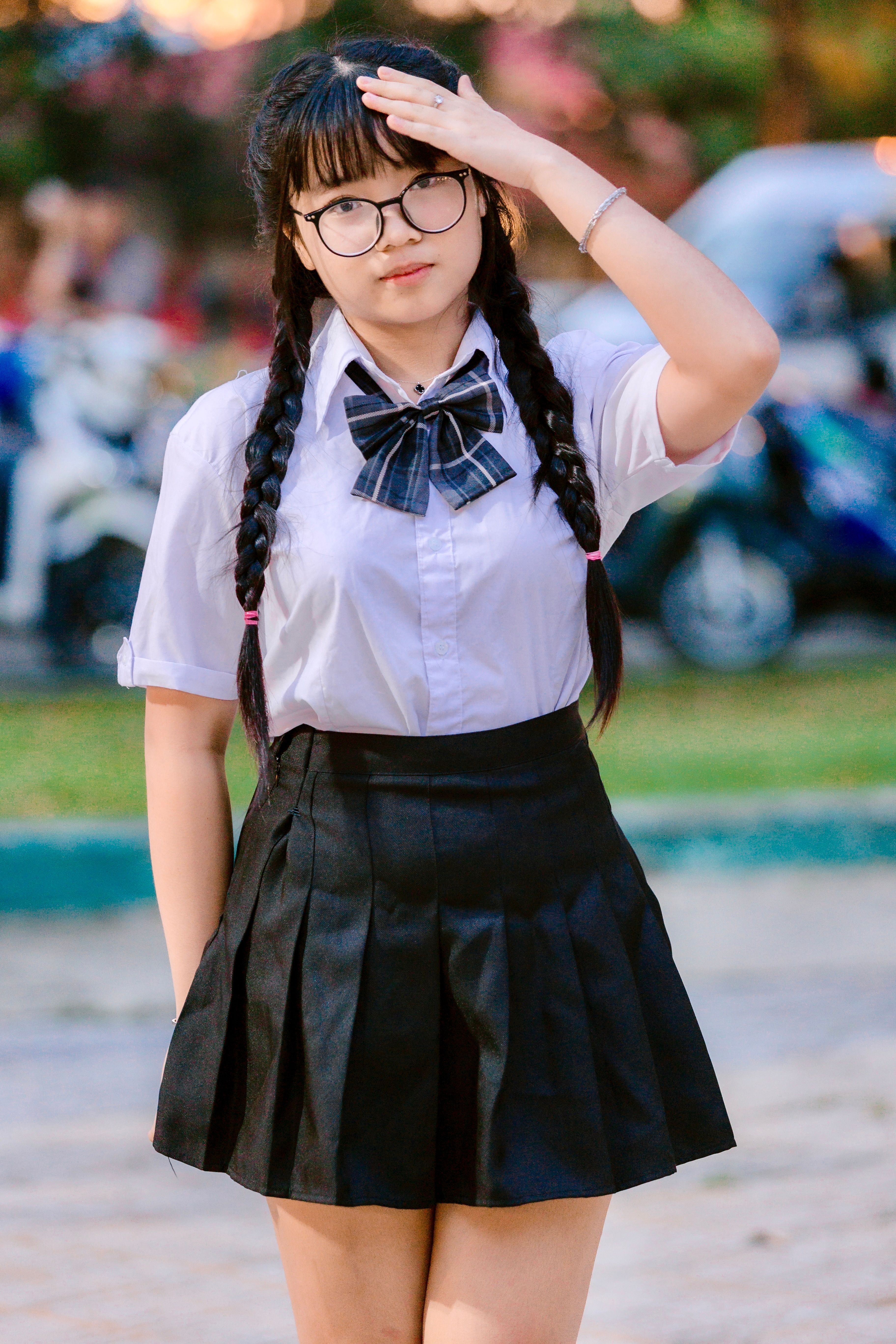 Young Woman in School Uniform Outdoors · Free Stock Photo