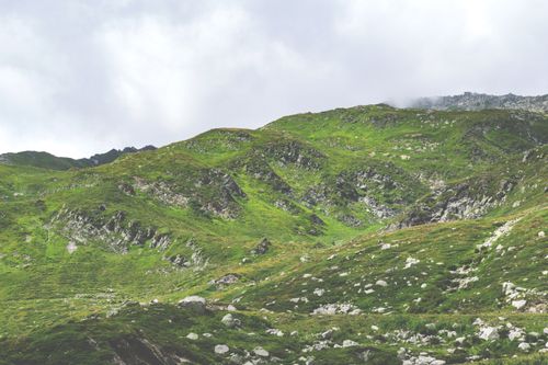 Free Explore the serene, green mountains of Airolo, Switzerland, perfect for nature and travel enthusiasts. Stock Photo