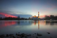 Mosque Near Body of Water during Golden Hour