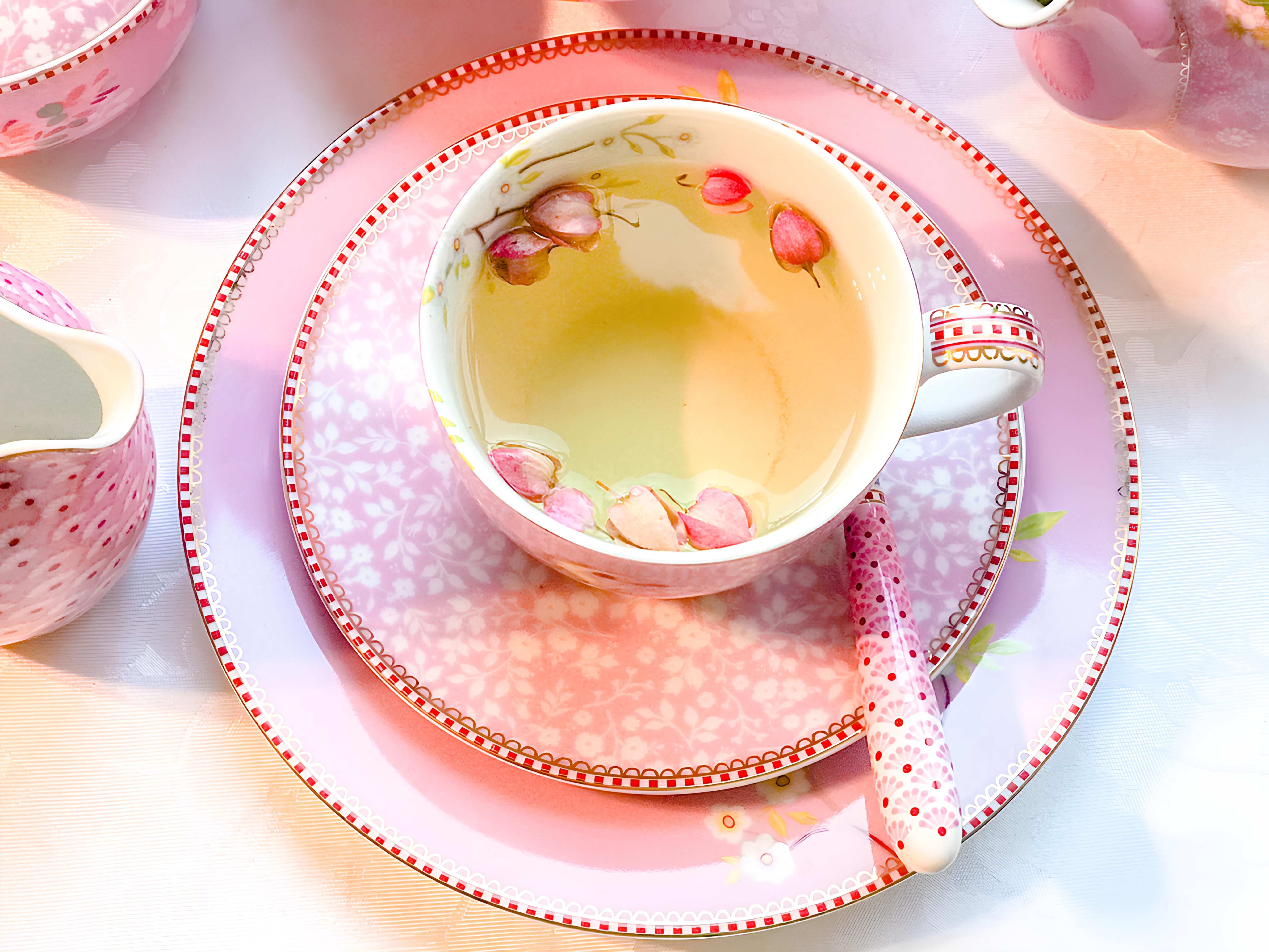 Elegant Tea Setting with Pink Floral Dishware · Free Stock Photo