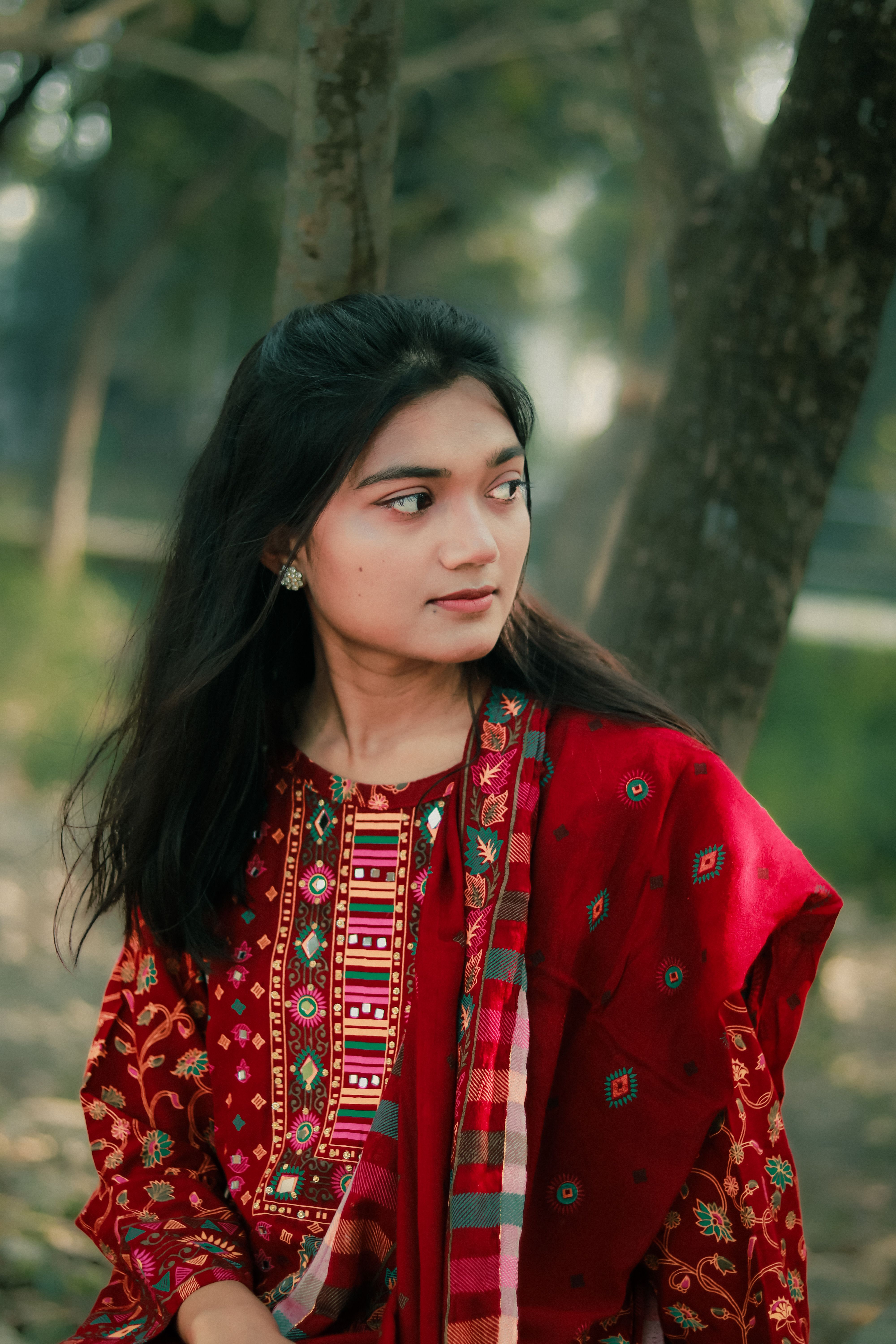 Portrait of a young woman wearing traditional Bengali clothing outdoors in Khulna, Bangladesh.