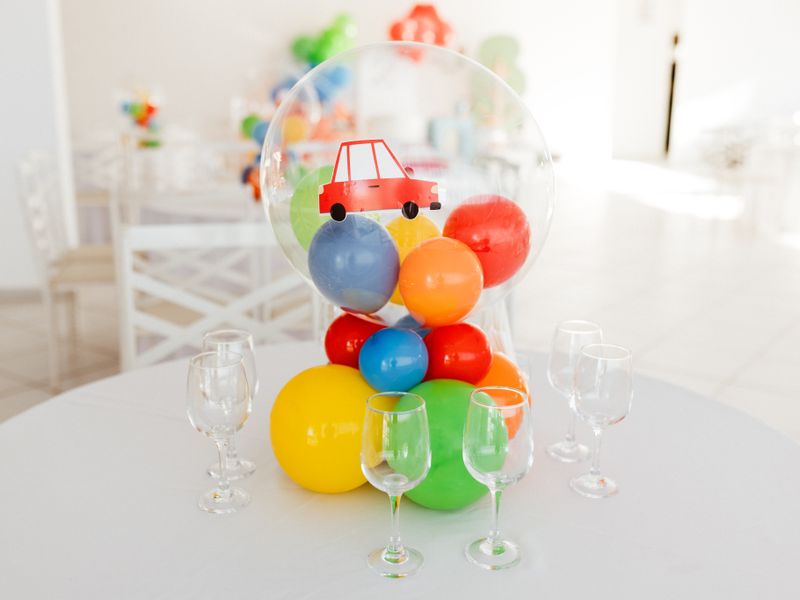 Kids party setup with colourful balloons and table settings