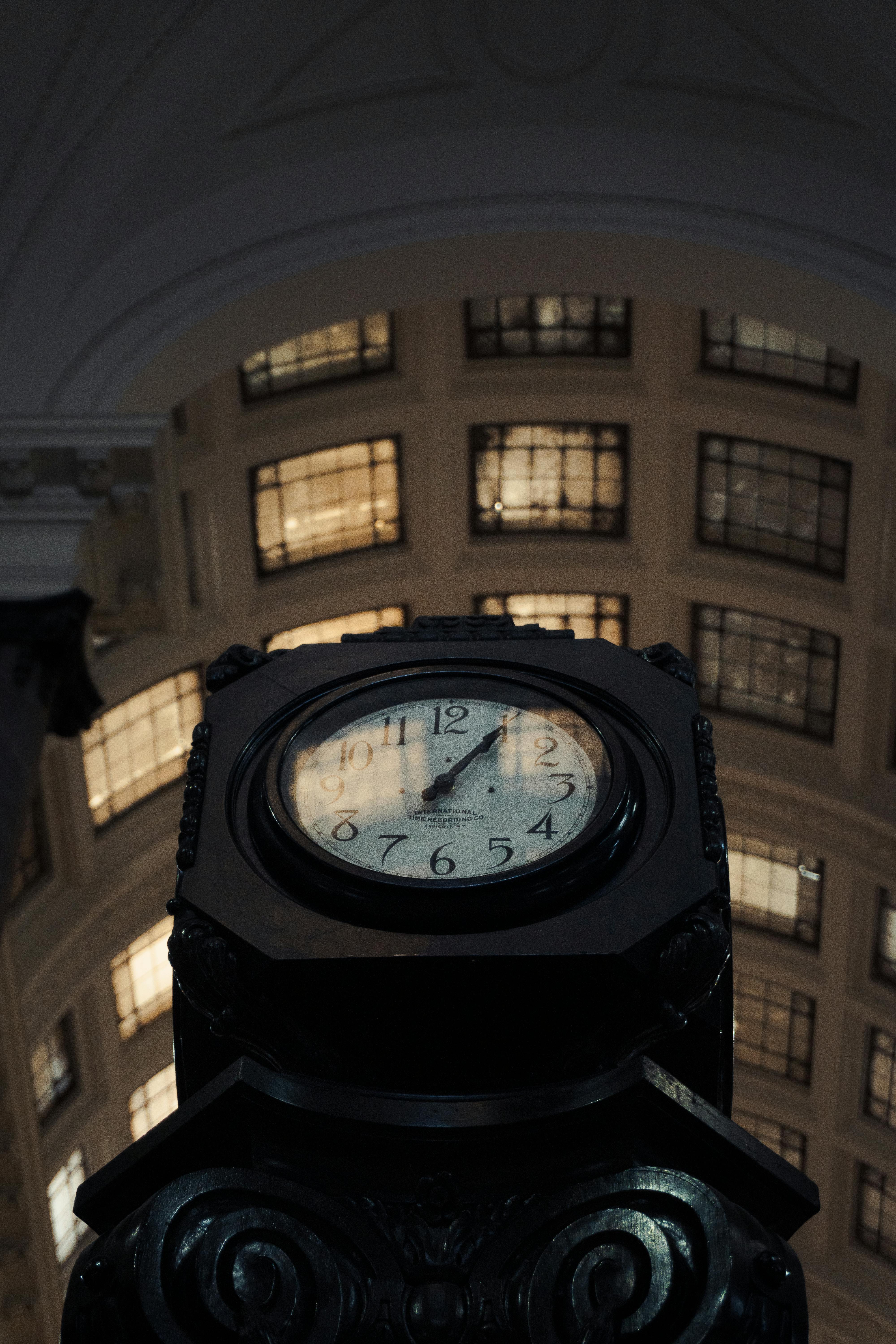 Free Vintage clock tower under elegant arches at night in Rosario, Argentina. Stock Photo