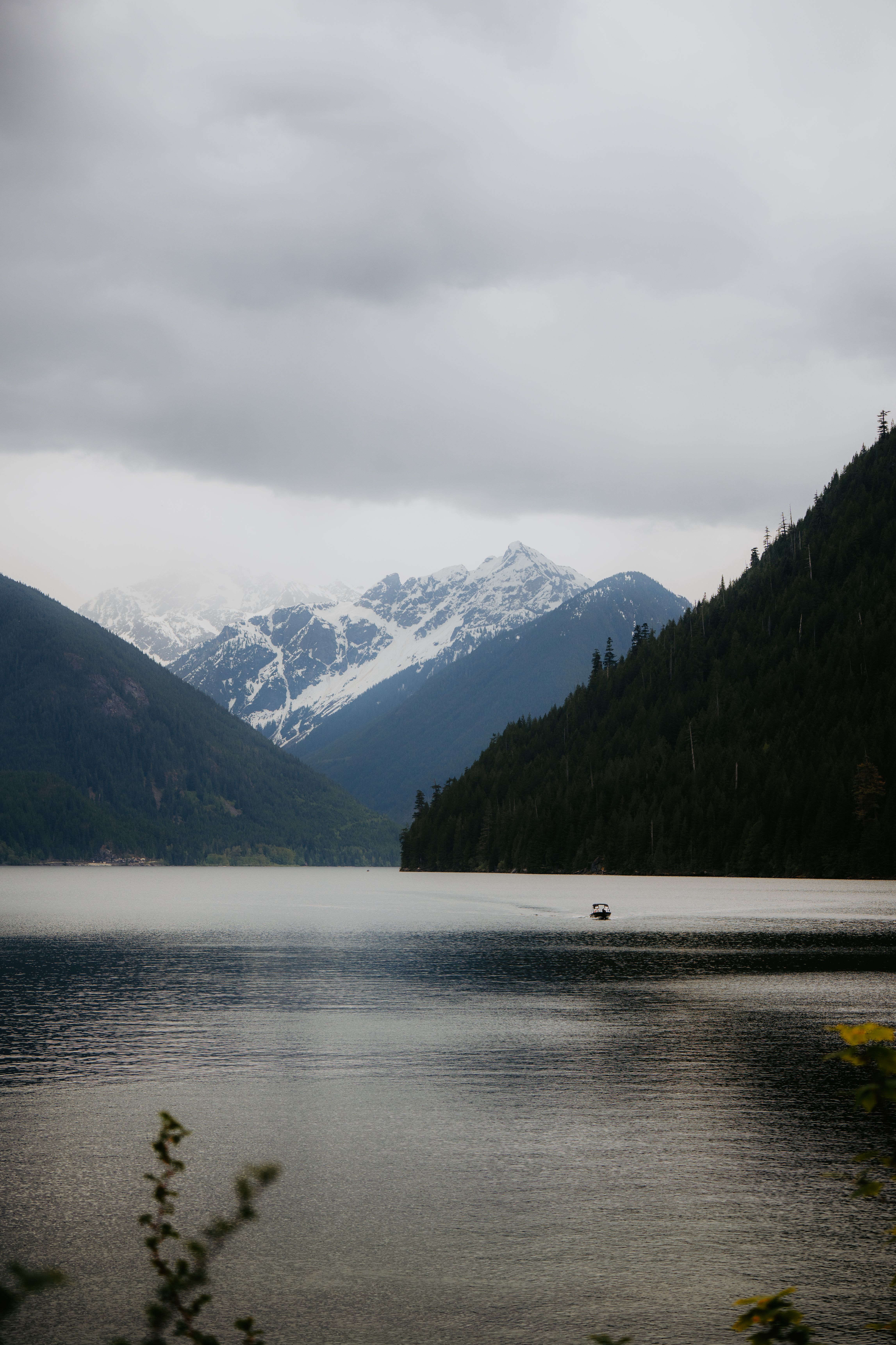 Scenic Mountain Lake with Snow-Capped Peaks · Free Stock Photo