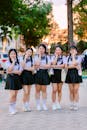 Group of Teenage Girls in School Uniforms Outdoors