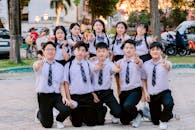 Group of Students Posing Outdoors with Peace Signs