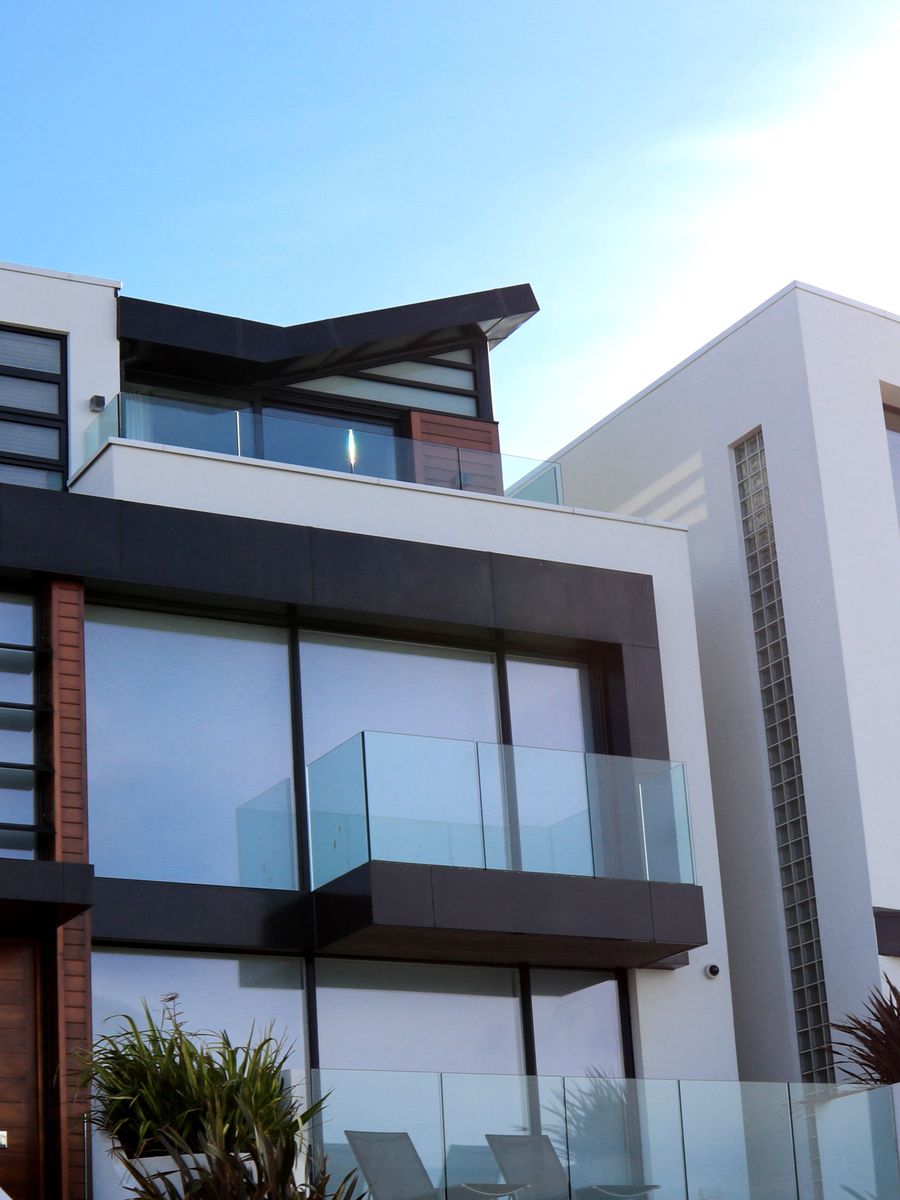 White modern building facade in hard daylight