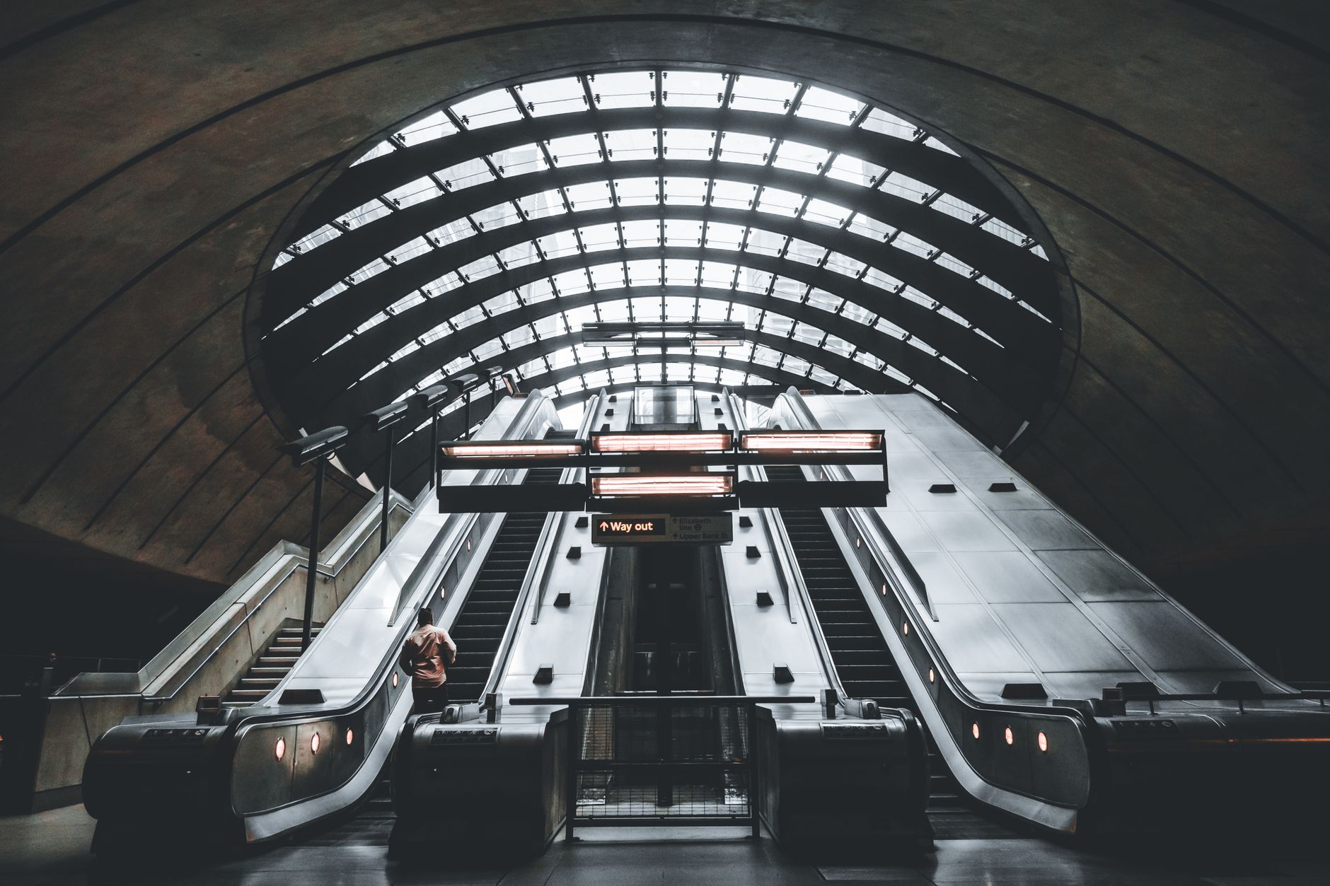 Stand on the right of the escalator