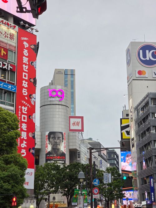 Free Vibrant street view of Shibuya with iconic 109 building, Tokyo, Japan. Stock Photo