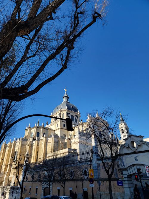 Free Captivating view of Almudena Cathedral under a clear blue sky in Madrid, Spain. Stock Photo