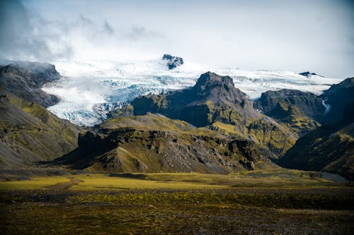 Ilmainen kuvapankkikuva tunnisteilla islanti, kalliovuori, lumihuippuinen