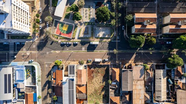 Top-down view of a busy street and buildings in Londrina, Brazil, during daytime.