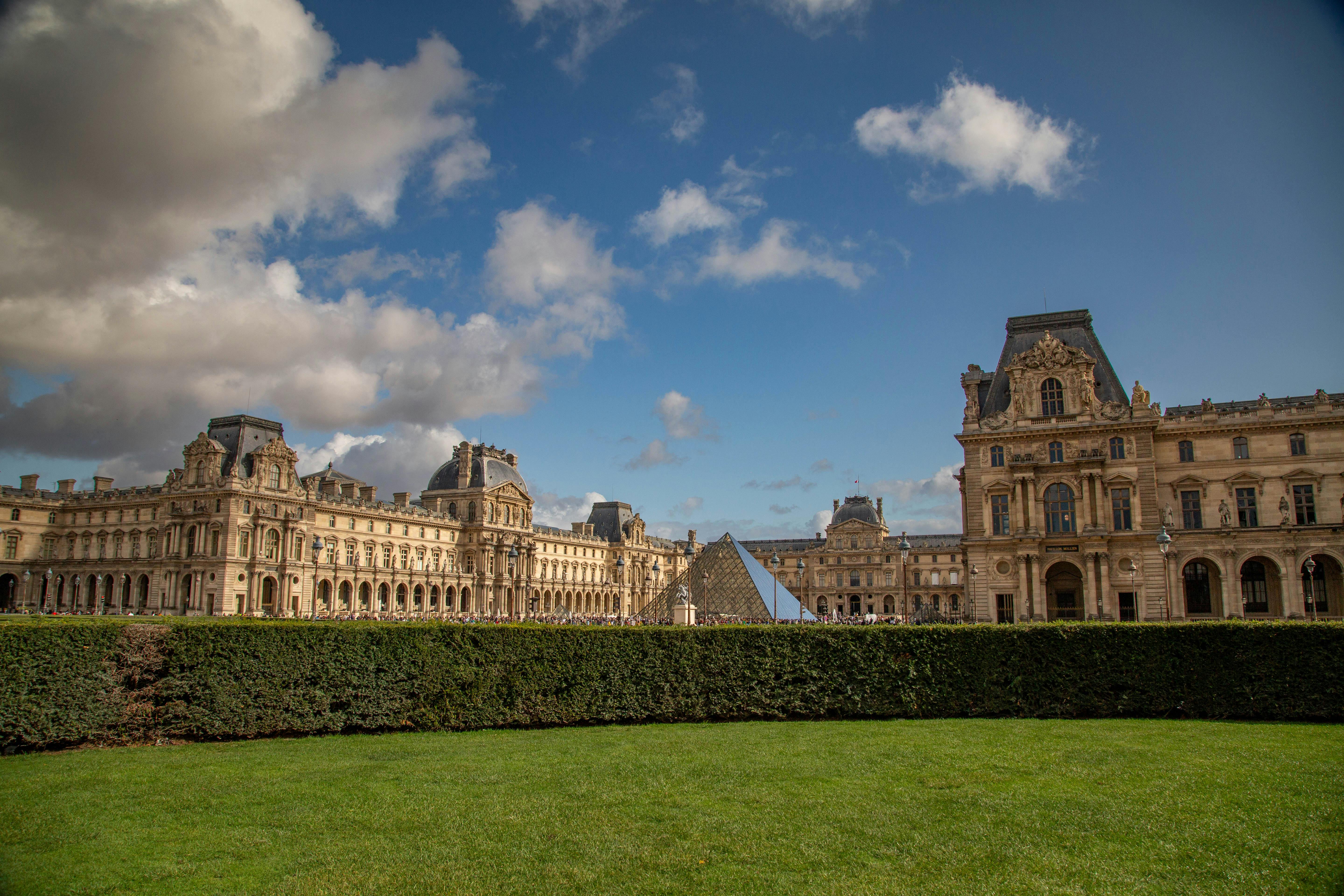 louvre museum and pyramid on a clear day