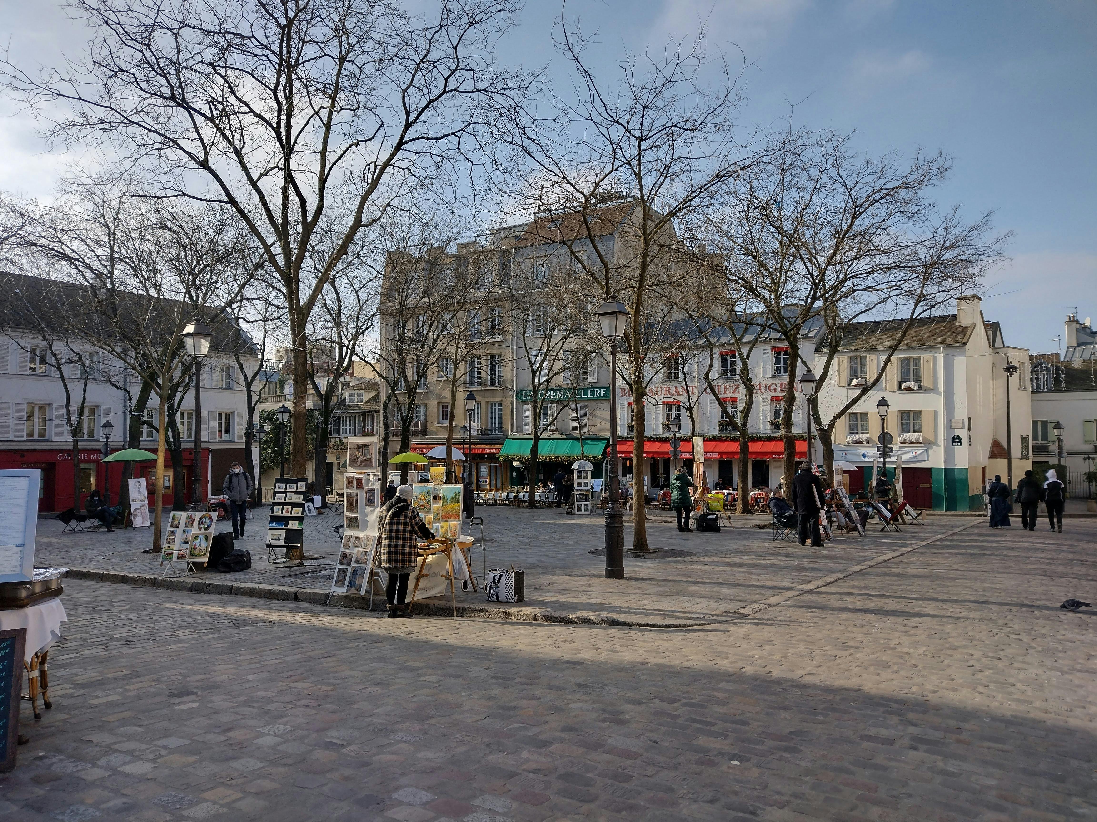Artists painting in Place du Tertre, Montmartre - nice things to do in paris