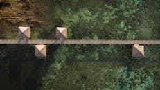 Aerial View of Wooden Pier and Huts in East Nusa Tenggara