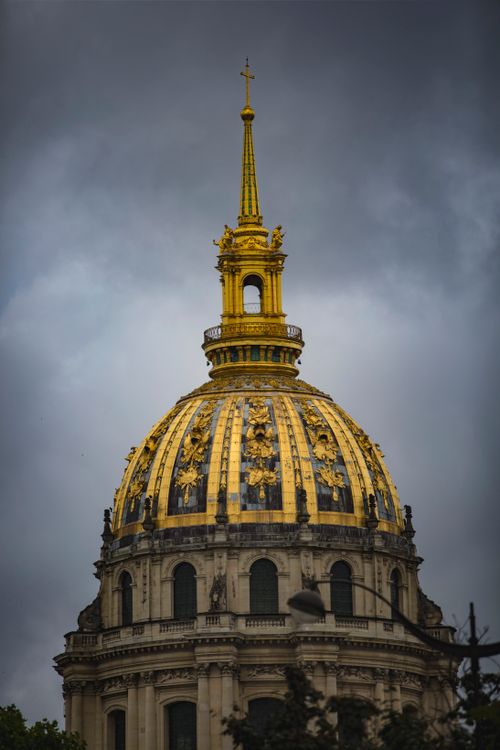 Free Stunning view of the golden dome of Les Invalides against a moody sky. Stock Photo