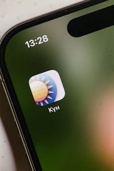 Smartphone screen showing a weather app icon and time display.