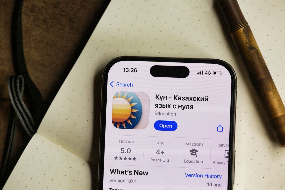 Person using a language learning app on a smartphone