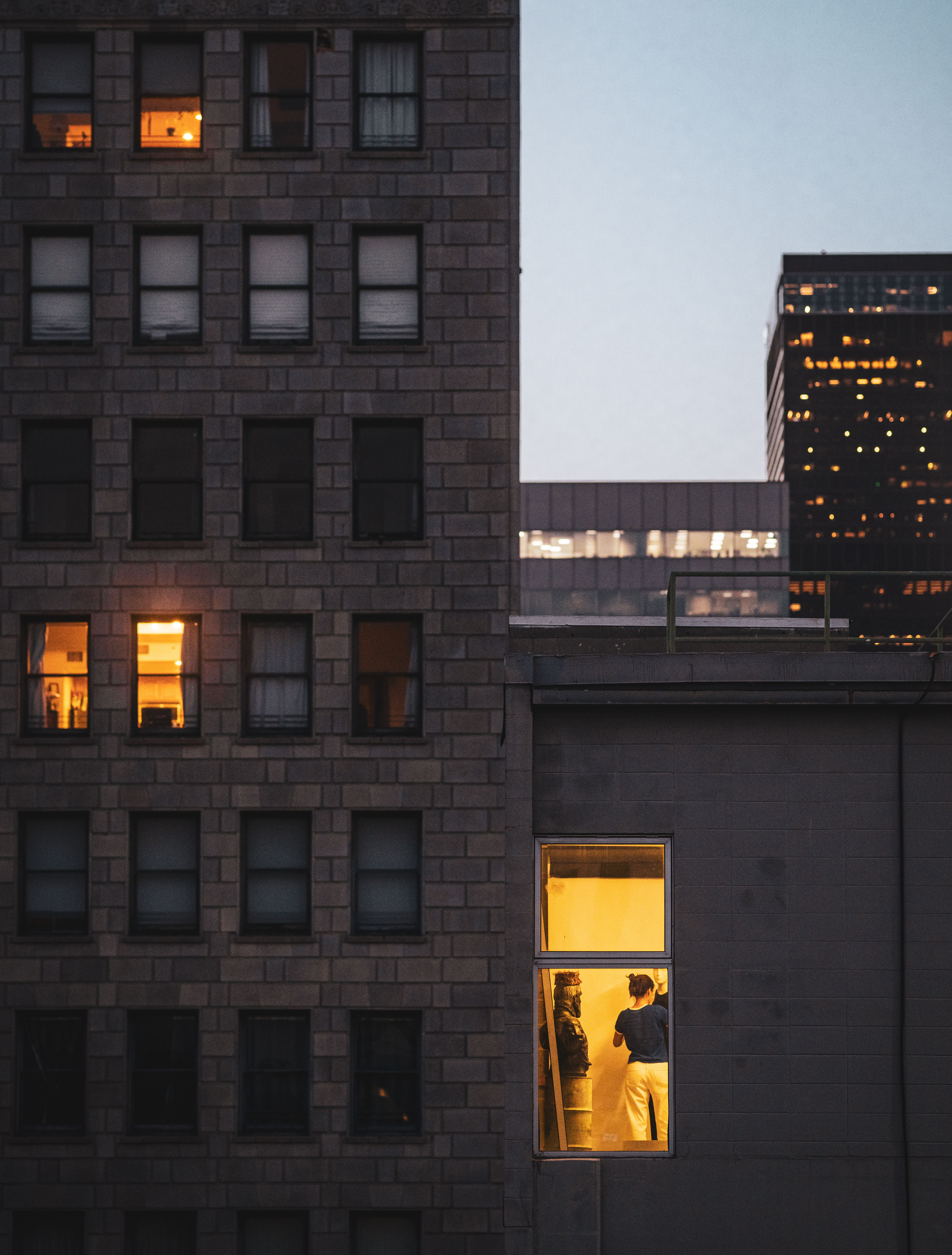 Nighttime Urban View with Lit Apartment · Free Stock Photo